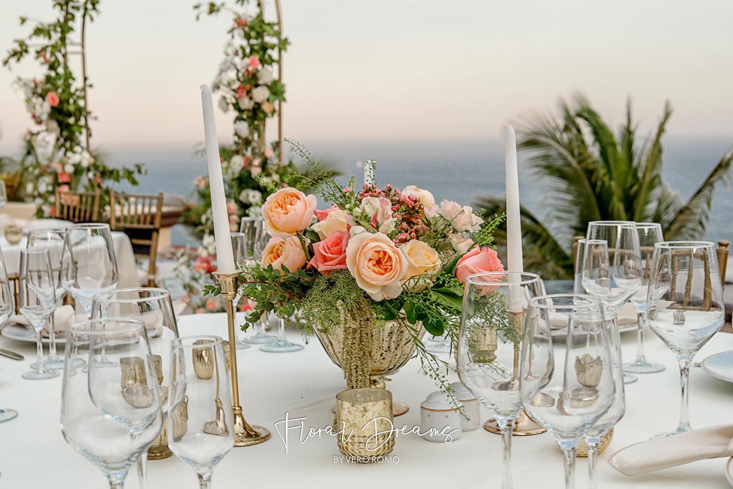 peach and pink wedding reception centerpiece