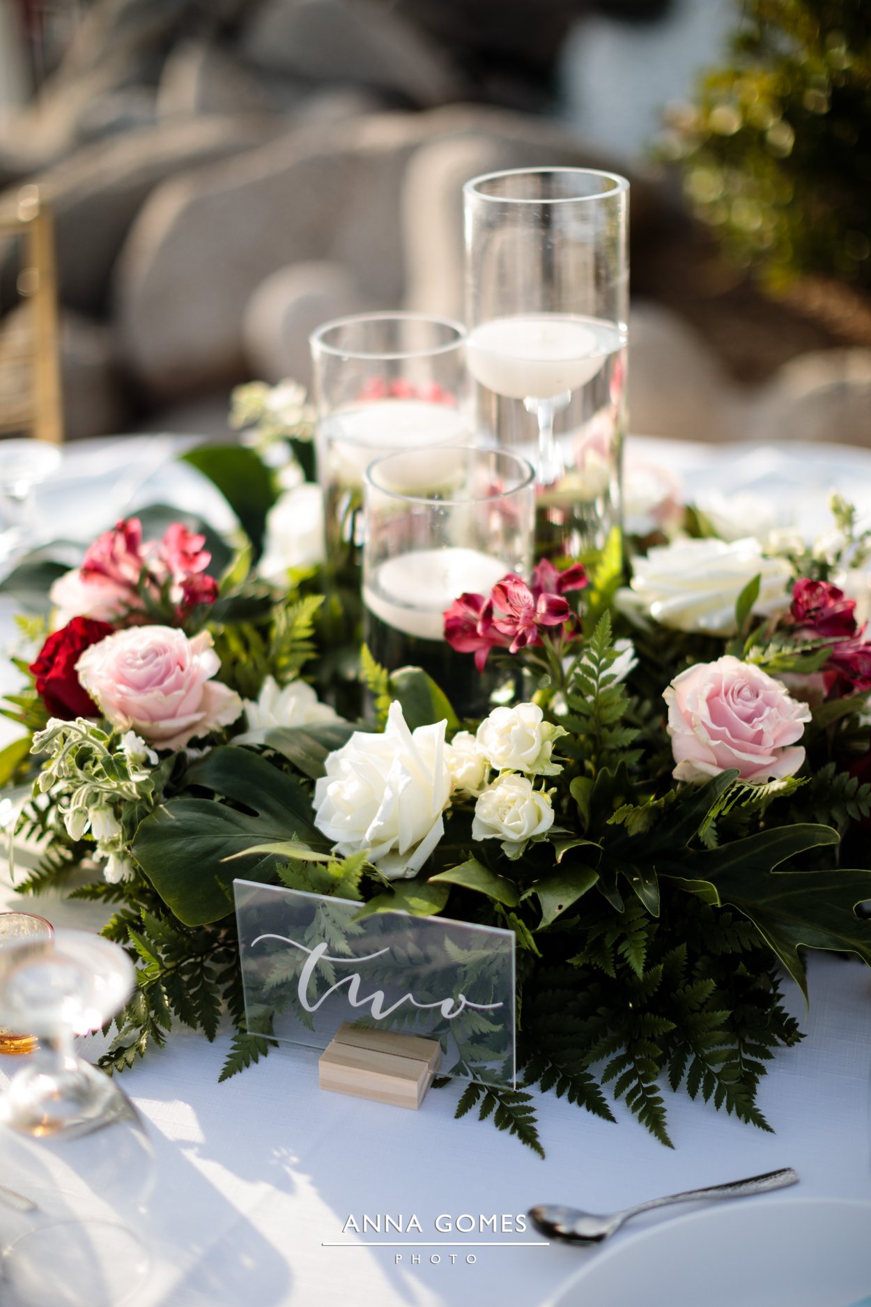 floral wedding centerpiece with candles