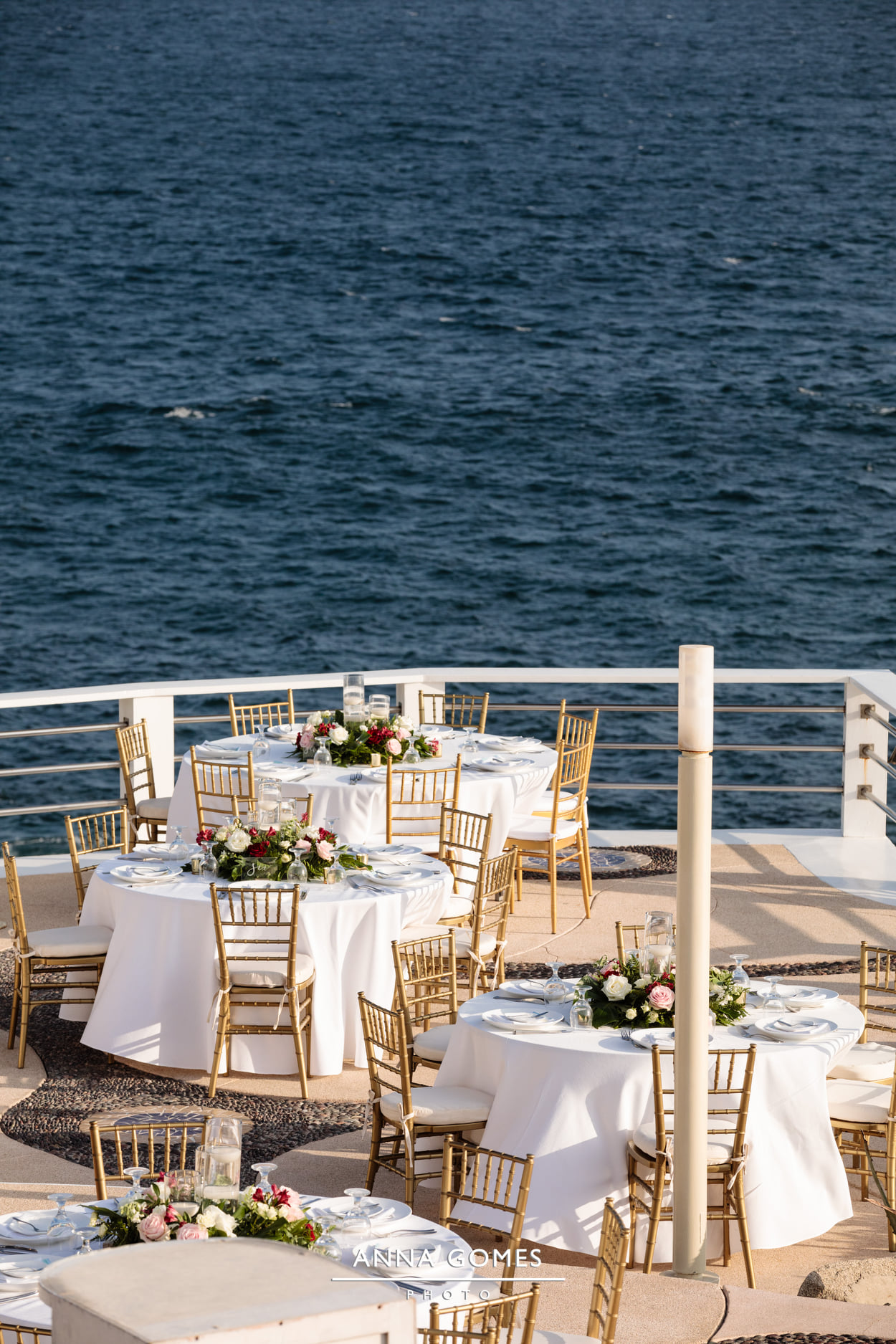 outdoor wedding reception overlooking ocean
