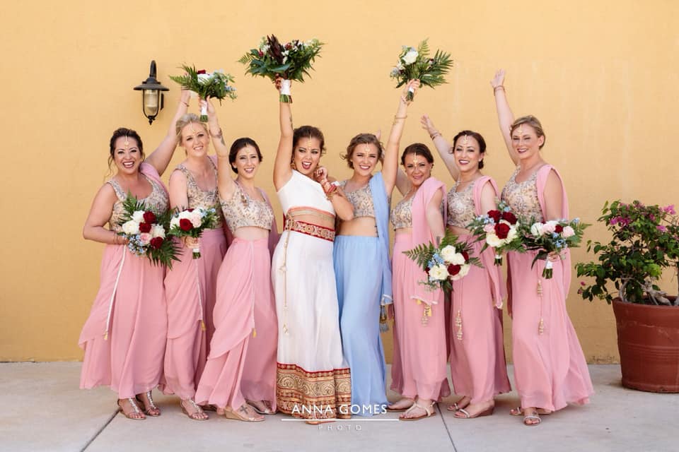 bride and bridesmaids cheering